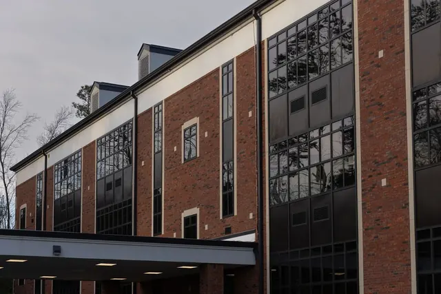 Brewer Hall brick and black window walls