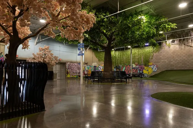 Blossom trees and polished floors inside The Alley