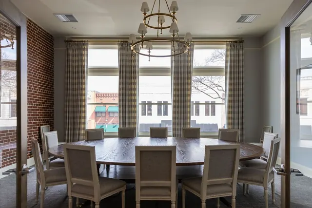Conference room with a chandelier and round table
