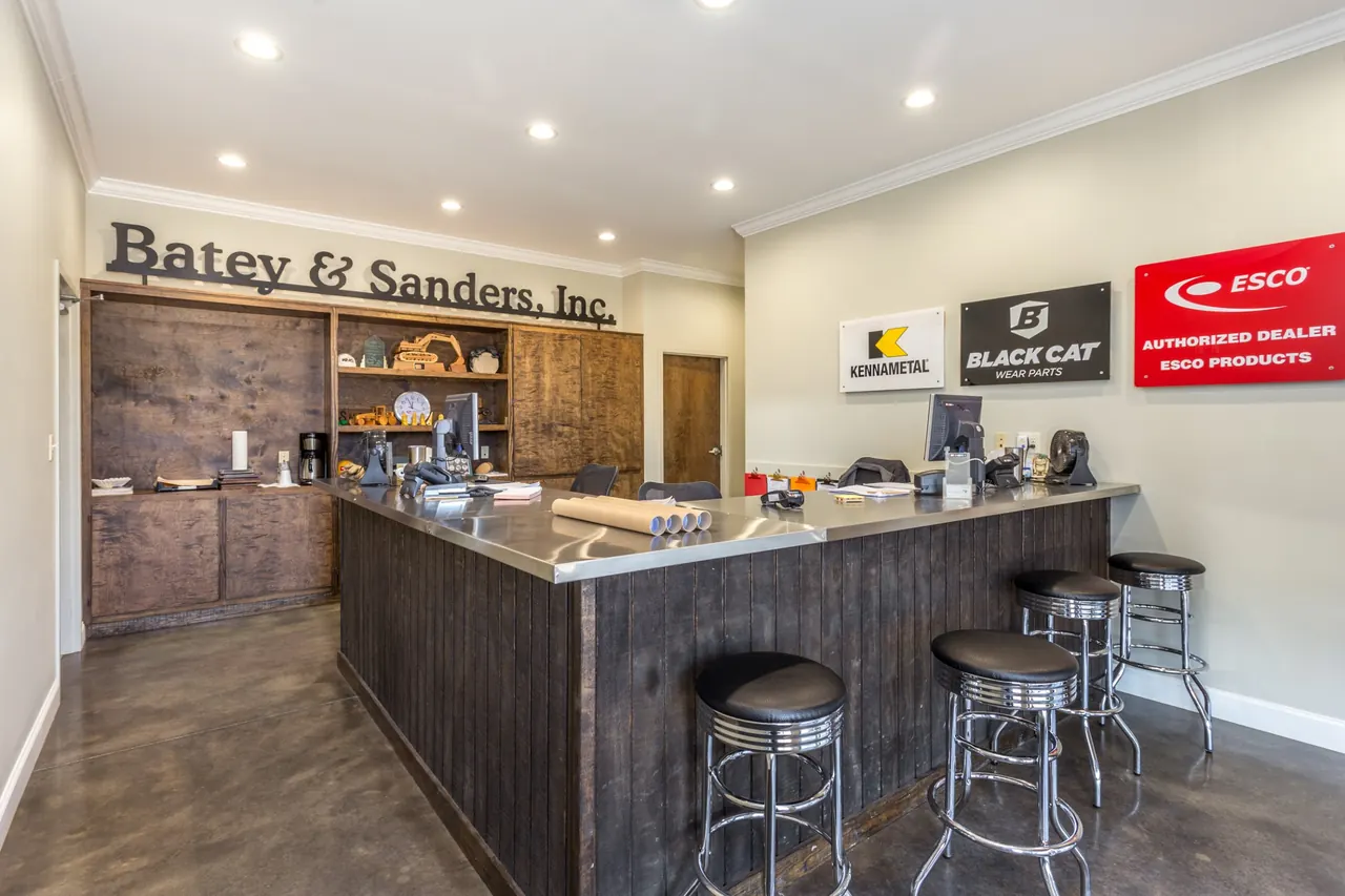 Batey & Sanders parts counter with barn wood paneling