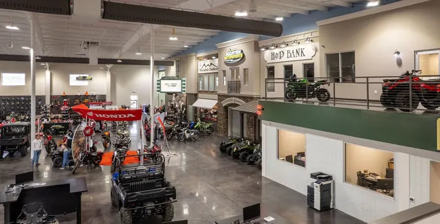 Mountain Motorsports showroom with motorcycles on the mezzanine