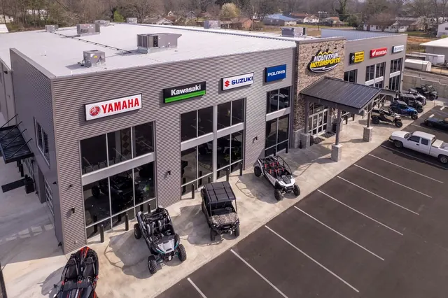 Mountain Motorsports from above, with Yamaha, Kawasaki, Suzuki and Honda signs