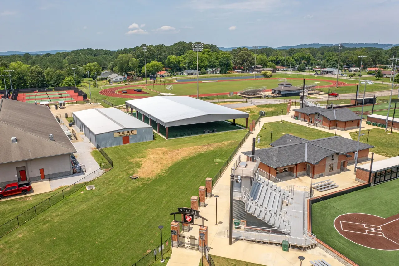 Training facility roof beside the softball field and stands